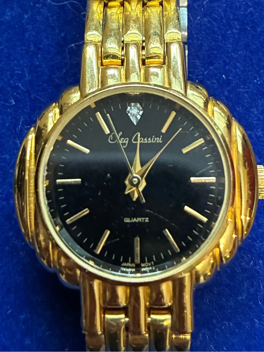 Oleg Cassini Swiss Quartz & Diamond Watch with Gold Tone Basket Weave Band